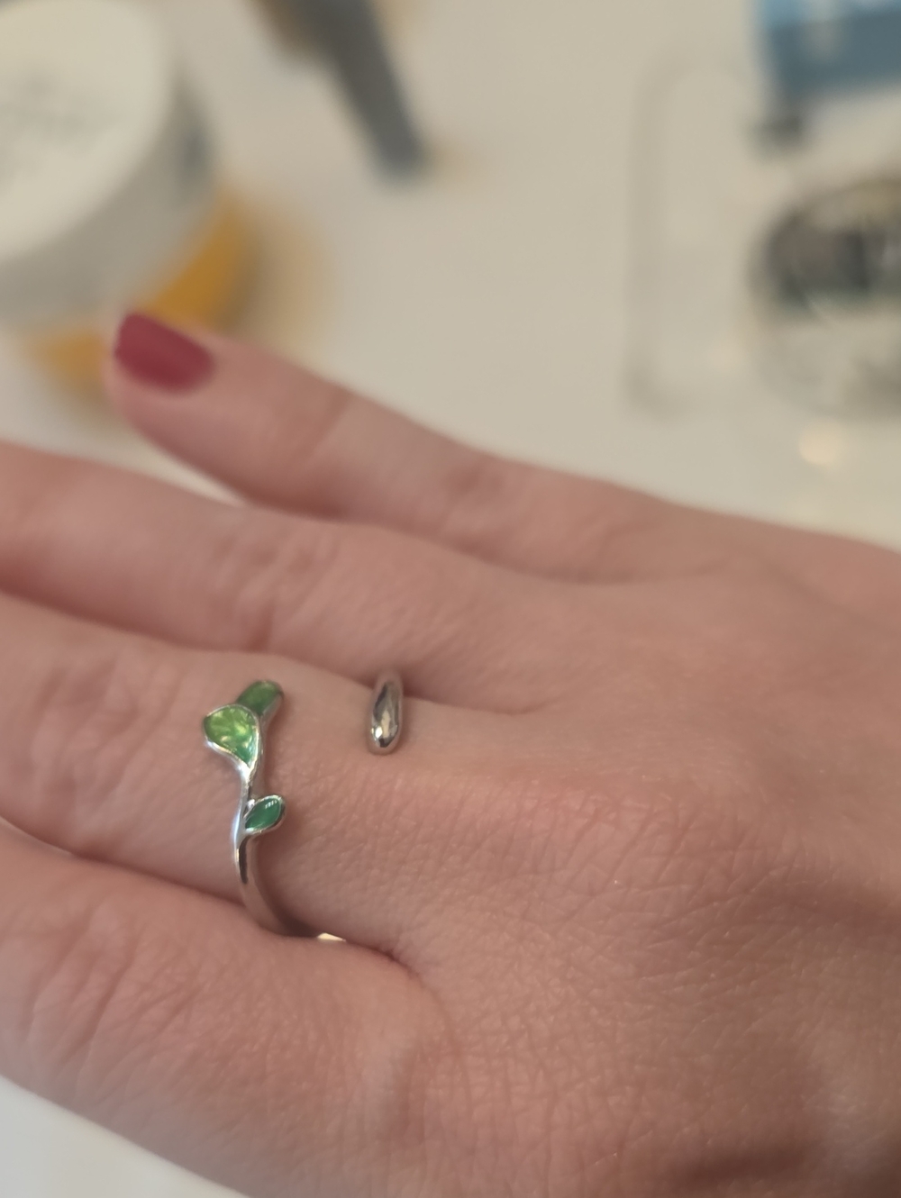 Sterling Silver Leaf Open Ring with Green Gem Accents